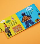 Gund® Animated Peek A Boo Elmo and Book