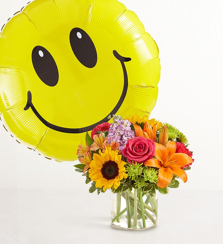 Floral Embrace™ with Jumbo Smile Balloon