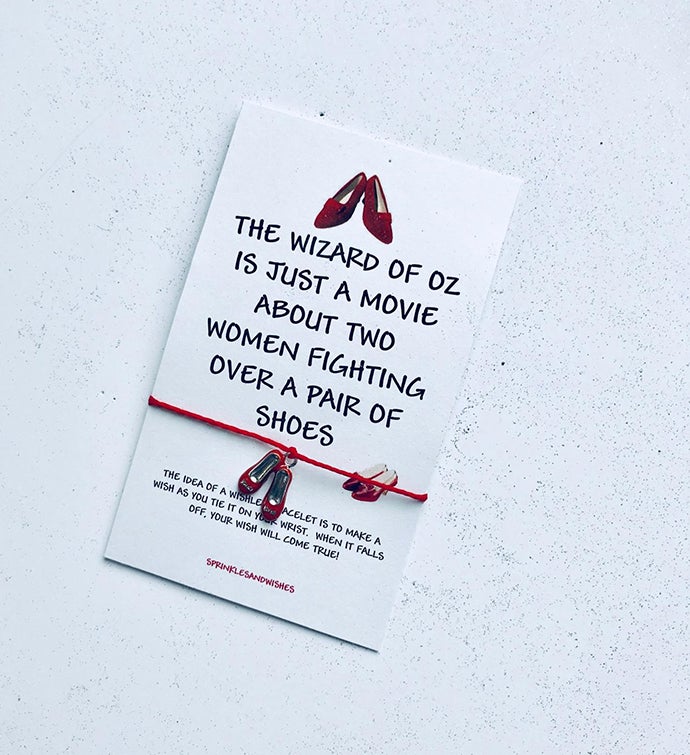 Two Women Fighting Over A Pair Of Shoes Wish Bracelet